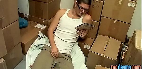  Austin Lucas plays with his feet and cock in a storage room